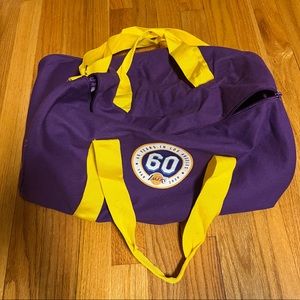 Los Angeles Lakers purple duffel bag and purple fold up bag (never used)!